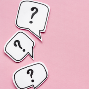 3 conversation bubbles with question marks on pink background