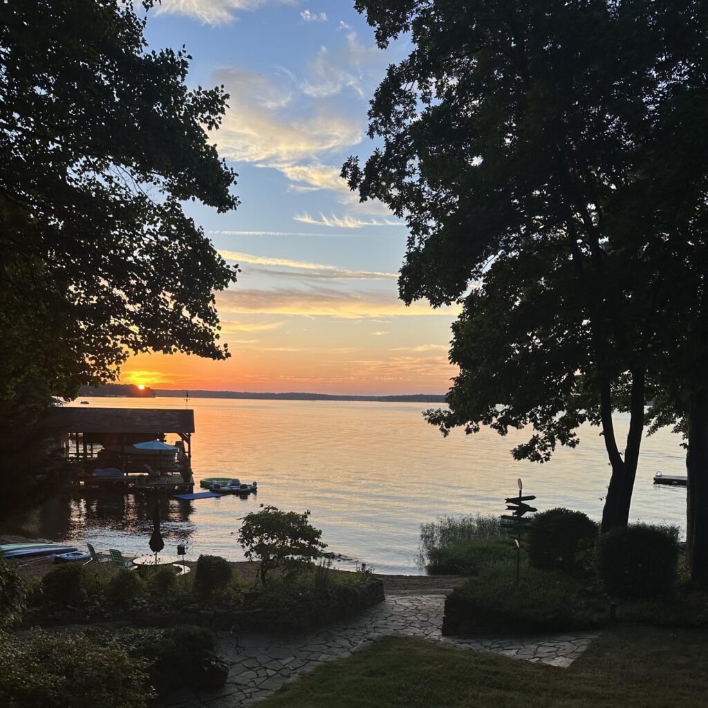 meditative view of sunset over a lake