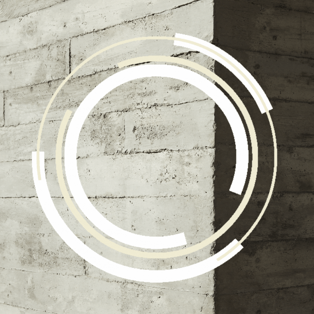 swirling circles in front of a concrete wall representing our shared context