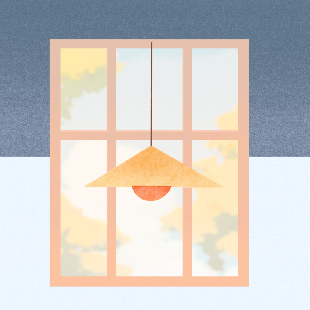 pendant light in front of sunny window representing time passing on a productive day